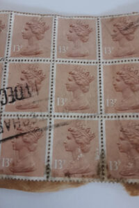 21x mixed franked british queen stamps