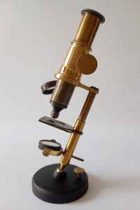 Vintage brass compact scientific slide microscope