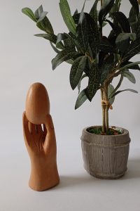 Vintage Carved light wood hand & egg figurine